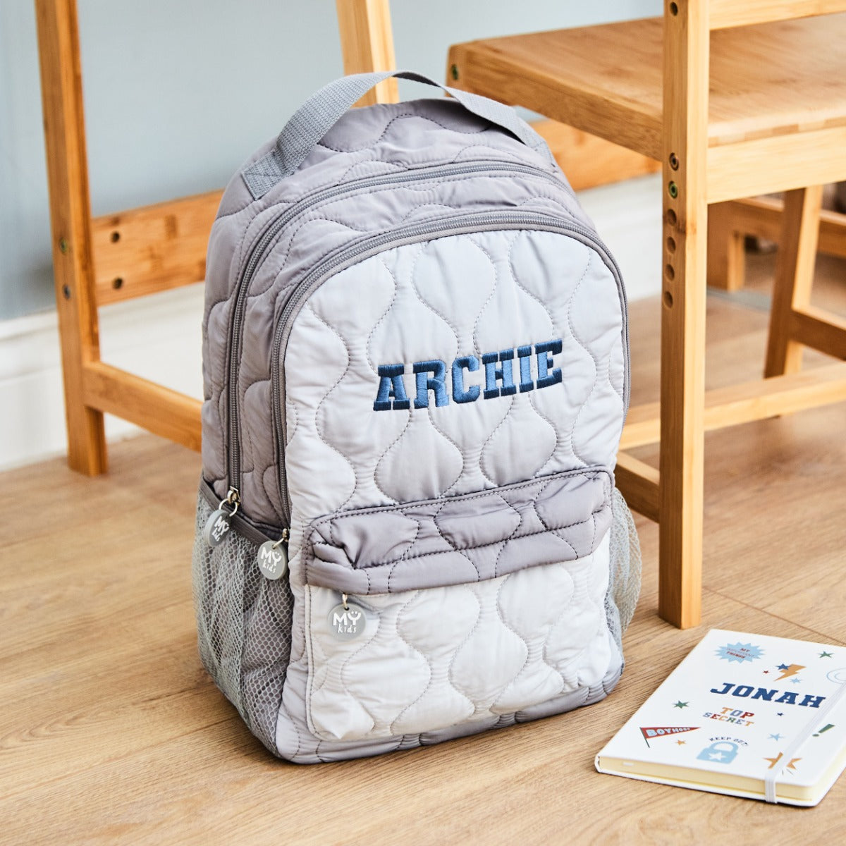 Personalised Large Grey Quilted Blue Name Varsity Backpack 