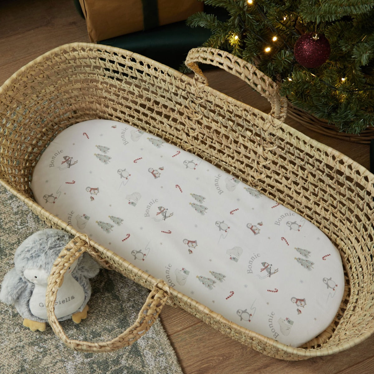 Personalised Penguin Skiing Moses Basket Bed Sheet