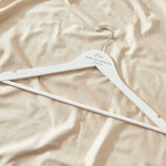Personalised Black & White Wedding Wooden Coat Hanger in White